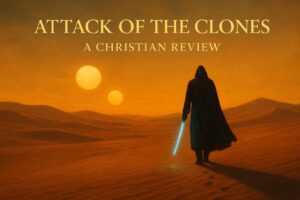 A lone, cloaked traveler walks across a glowing desert with twin suns in the sky, holding a blue staff of light. Gold serif title reads: “Attack of the Clones – A Christian Review.”